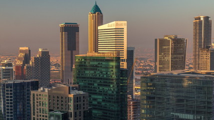 Dubai's business bay towers at morning aerial timelapse.