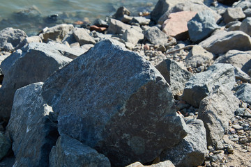 big stones on the river bank