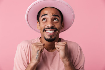 Photo of happy african american man smiling and looking upward