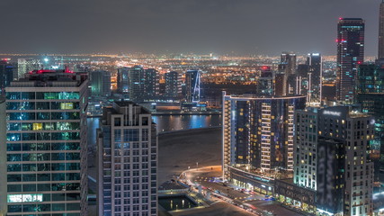 Dubai's business bay towers aerial night timelapse.