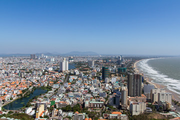 A birds eye view of Vung Tau, Vietnam meeting the shoreline