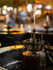 Water splashes from an Armenian drinking fountain