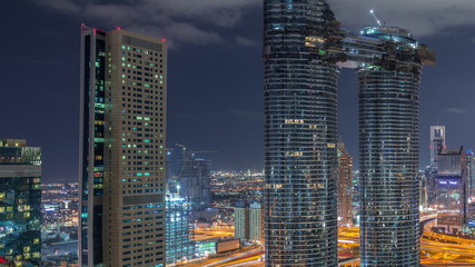 Obraz na płótnie Canvas Amazing aerial view of Dubai downtown skyscrapers night timelapse, Dubai, United Arab Emirates