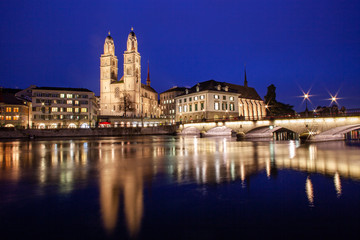 Fototapeta na wymiar scenic view of historic Zurich city center with famous Grossmunster Churches and river Limmat at Lake Zurich, Canton of Zurich, Switzerland