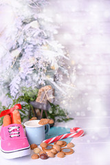 Traditional Dutch holiday for children Sinterklaas. Winter holidays in Europe and the Netherlands. background with pepernoten and traditional sweets strooigoed, Carrot in a boot and milk with cookies.