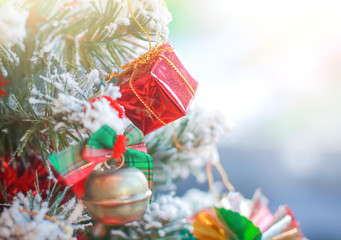 Blurry of Christmas and New Year's balls with beautiful decorations on the Christmas tree, soft light, beautiful background images and illustrations.