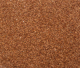 Brown buckwheat groats. Top view, copy space