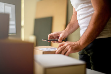 Delivery service, scanning a shipping label	