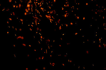 flame of fire with sparks on a black background