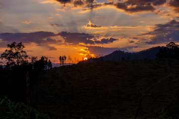 Beautiful sunset behind a hill