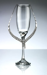 jewelery necklace in wine glass