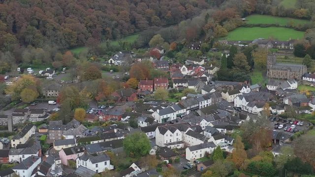 Aerial dolly pullback view of Dulverton high street, located on the River Barle on the edge of Exmoor, UK.
