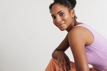 Portrait of african american woman smiling and looking at camera