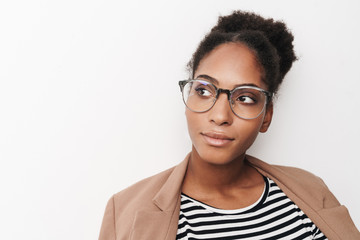 Portrait of african american cute woman posing and looking aside