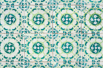 Portuguese wall tiles with blue and green geometric pattern.  