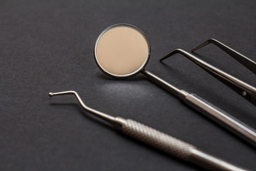 Set of metal dental instruments for teeth dental care
