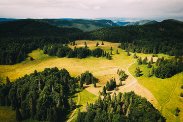 Fototapeta premium Slovak Paradise national park is really nice place with many hills and point of views. This is view from drone. Ther are many woods and many pastures.