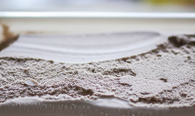 Melting chocolate ice cream close up