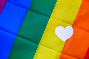 Gay pride flag texture with blank heart on the right