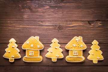 Сhristmas ginger cookies on dark wooden background with copy space for your text