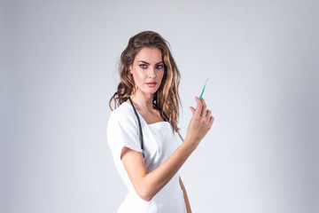 Doctor, researcher or scientist holding injection shot, measles, rubella or hpv vaccine and syringe...