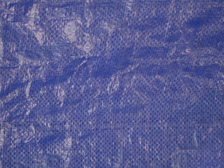 texture blue plastic bag, used dirty canvas, concept recycle plastic