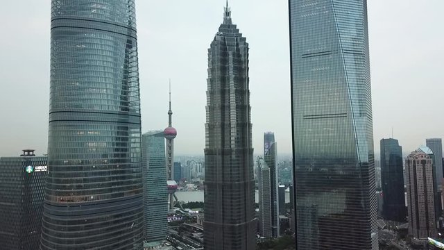 Shanghai, China - 5 September 2019: Ascending drone view of the 3 tallest building in Shanghai