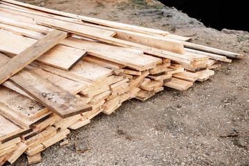 stack of formwork boards at the construction site