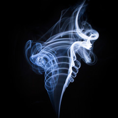 Blue smoke on black background