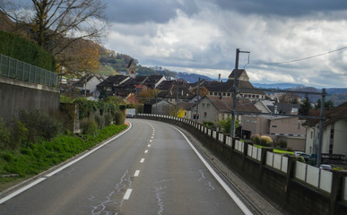 Fototapeta na wymiar road among the mountains in the village