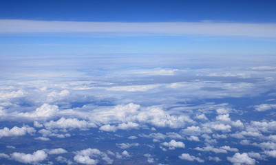 Fototapeta na wymiar Blue sky and clouds, View from window of airplane.