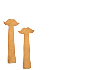 Homemade gingerbread cookies moustache isolated on a white background. Empty space for text input