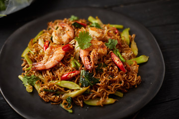 Stir fried noodles with shrimps and vegetables..