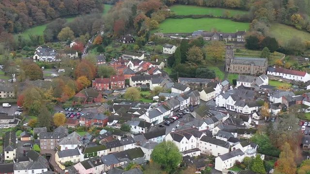 Aerial view of Dulverton high street and All Saints church, located on the River Barle on the edge of Exmoor, UK.