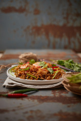Stir fried noodles with shrimps and vegetables..
