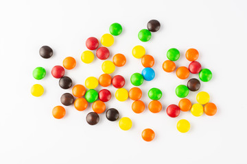 Group of colorful candies over white background.