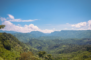 Fototapeta premium Mountainous landscape, mountains and jungle with a clear sky