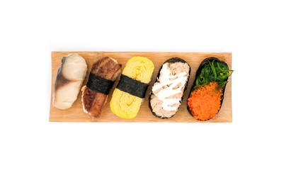 Set of sushi on bamboo wooden plate isolated on white background, Japanese food concept, Top view with copy space