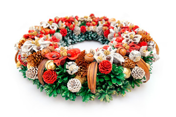 Christmas Holiday Wreath lying on Isolated White Background