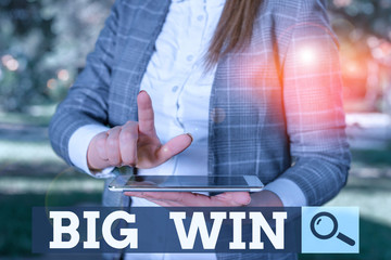 Word writing text Big Win. Business photo showcasing having won an important prize Money won by success in a game Outdoor scene with business woman holds lap top with touch screen