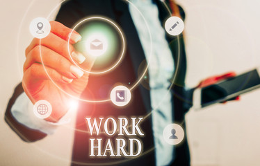 Text sign showing Work Hard. Business photo showcasing Laboring that puts effort into doing and...