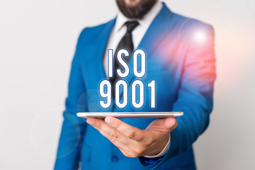 Conceptual hand writing showing Iso 9001. Concept meaning designed help organizations to ensure...