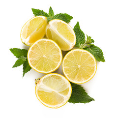 Composition of juicy lemons and mint leaves. Ingredients for cocktails, drinks and tea.