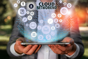 Handwriting text Cloud Networking. Conceptual photo sourcing and utilization of one or more network resources