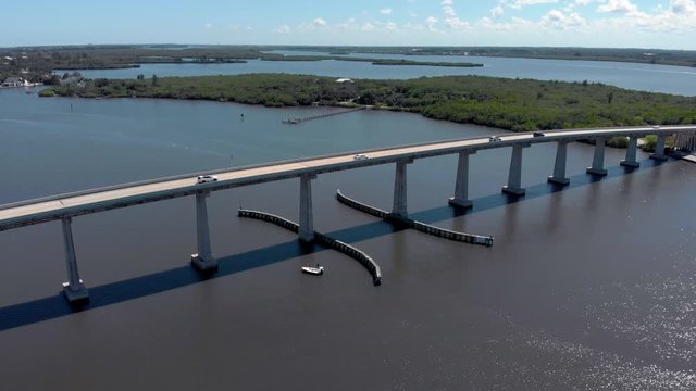 Indian River County Causeway over the Indian River Lagoon. Aerial drone shot of a Beautiful summer day on the water in Florida.