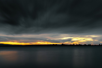 Dramatic stormy dark cloudy sky, natural photo background