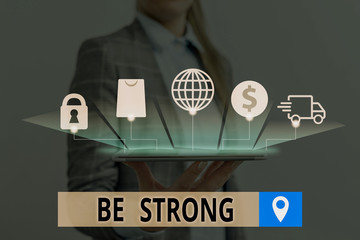 Conceptual hand writing showing Be Strong. Concept meaning able to withstand great circumstances or...