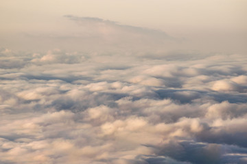 Clouds seen from above on sunrise texture