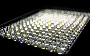 The wall of LED lamps is cold blue