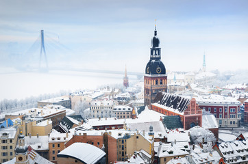 Panoramic view of the Riga old town and Daugava river from St. Peter's Church on a clear winter...